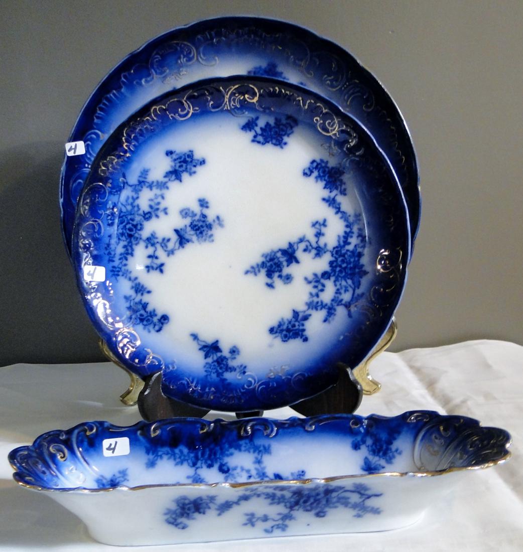 Flow Blue La Belle China Platters & Relish Dish: Flow Blue La Belle China large round serving platters (15" & 11"); along with a relish dish (14"l x 4.5" x 2.5"); all in good condition.