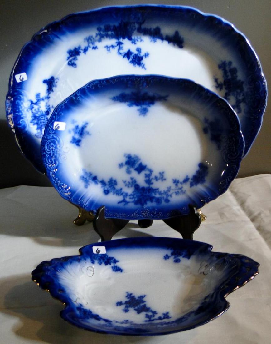 Flow Blue La Belle China Platters & Serving Dish: Flow Blue La Belle China group to include: a large platter (19" x 14"); medium platter (13" x 11"); and a serving dish (11" x 9"); all in good condition.