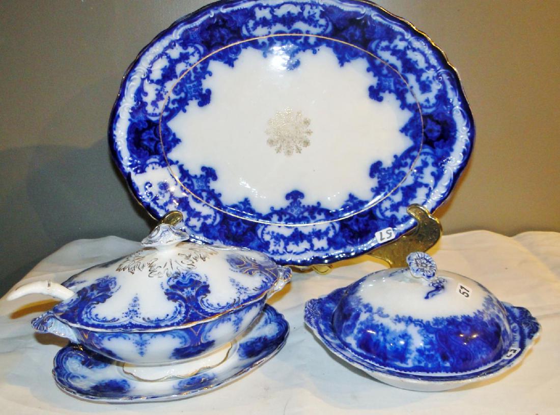 Flow Blue Wood & Sons, Burgess & Leigh + Group: Flow Blue group to include: Wood & Son Clarence small covered tureen with under plate and matching ladle (5.5"h x 8.5" x 6.5"); large platter, marked England and more (15" x 11"); and a Burgess & Leig