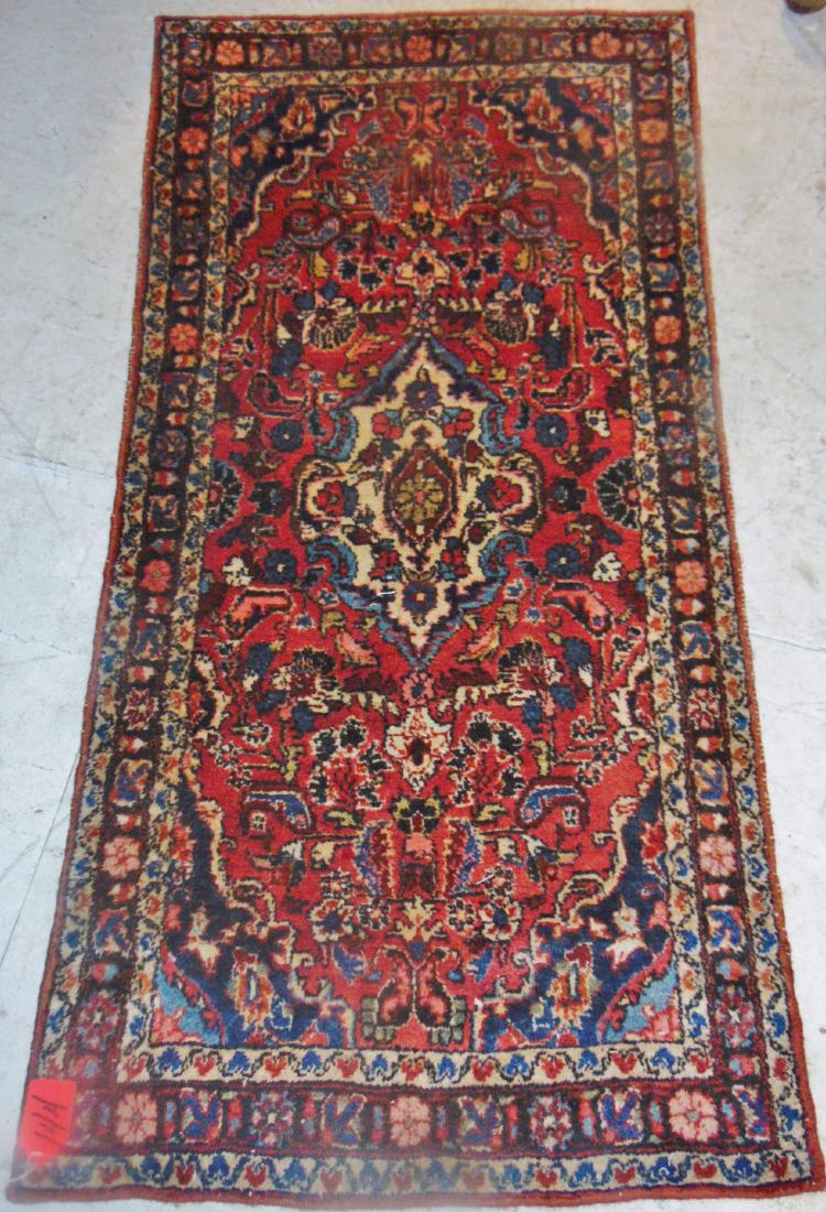 Middle Eastern Antique Rug: Middle Eastern hand tied rug, antique, with floral field, good condition (54" x 29").