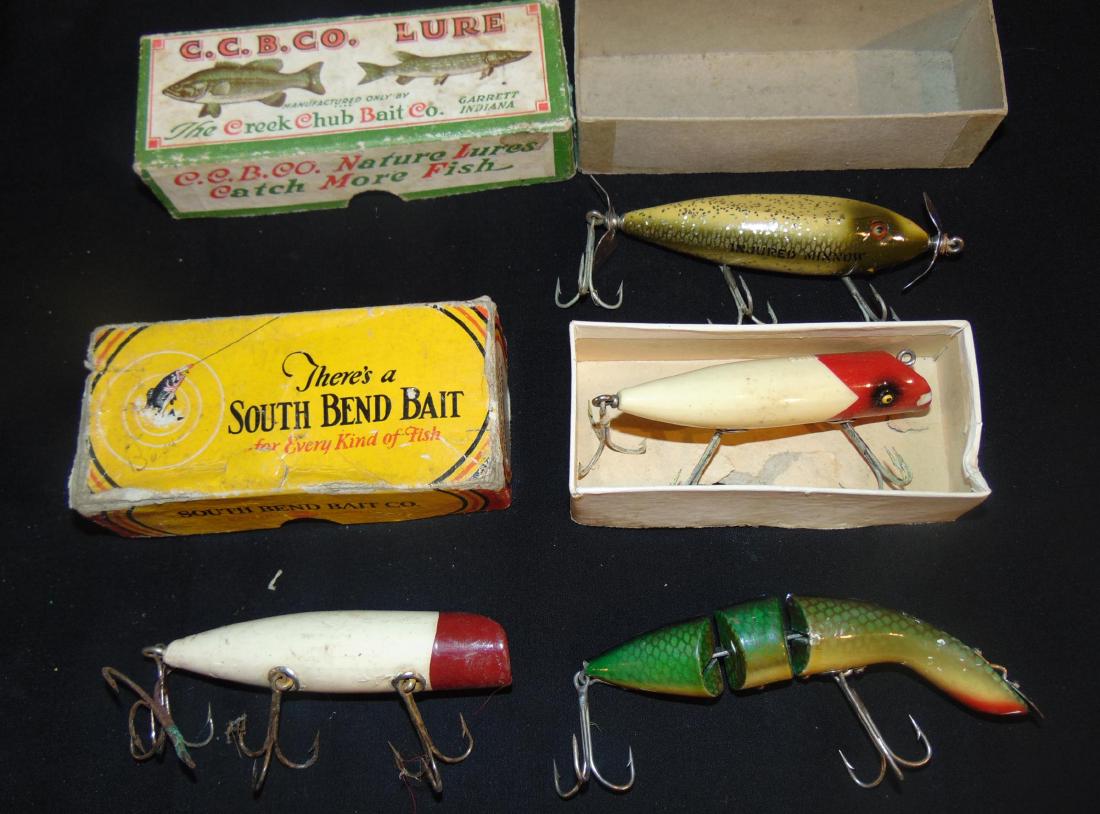 Group of 4 Vintage Fishing Lures: Group of vintage fishing lures: boxed lures from South Bend Bait and C.C.B.Co; along with 2 other lures.