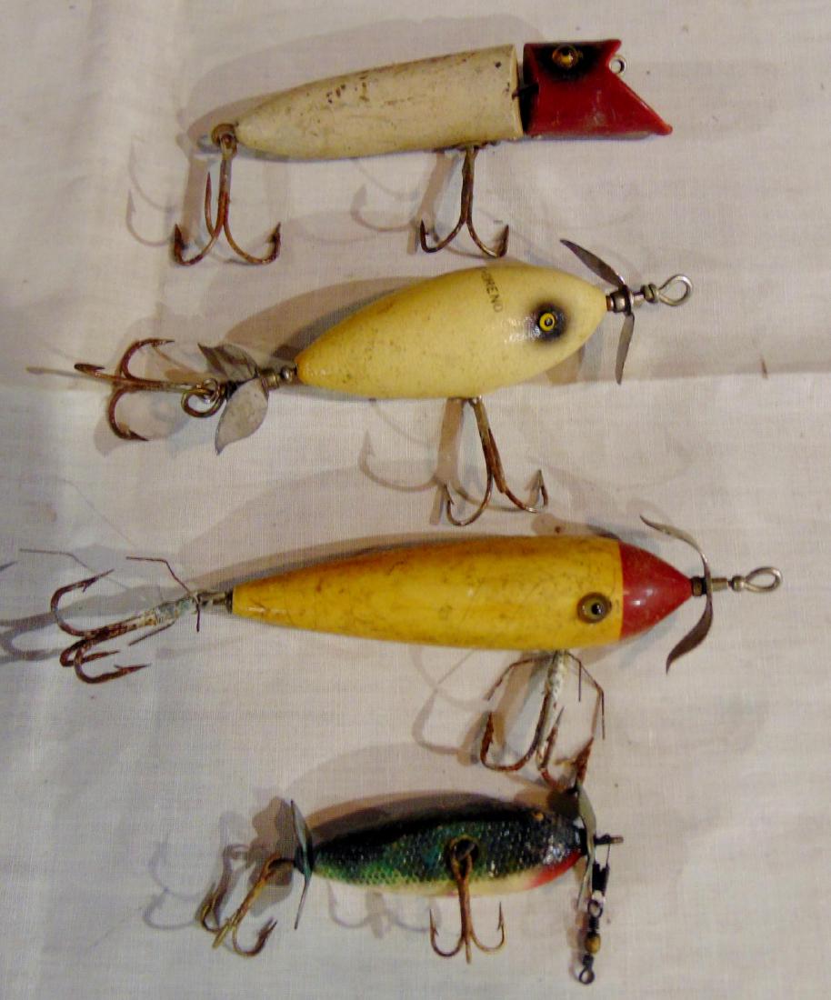 Group of Fishing Lures One Signed: Fishing lures, 4, one is signed Surf-Oreno, all with glass eyes, made of wood.