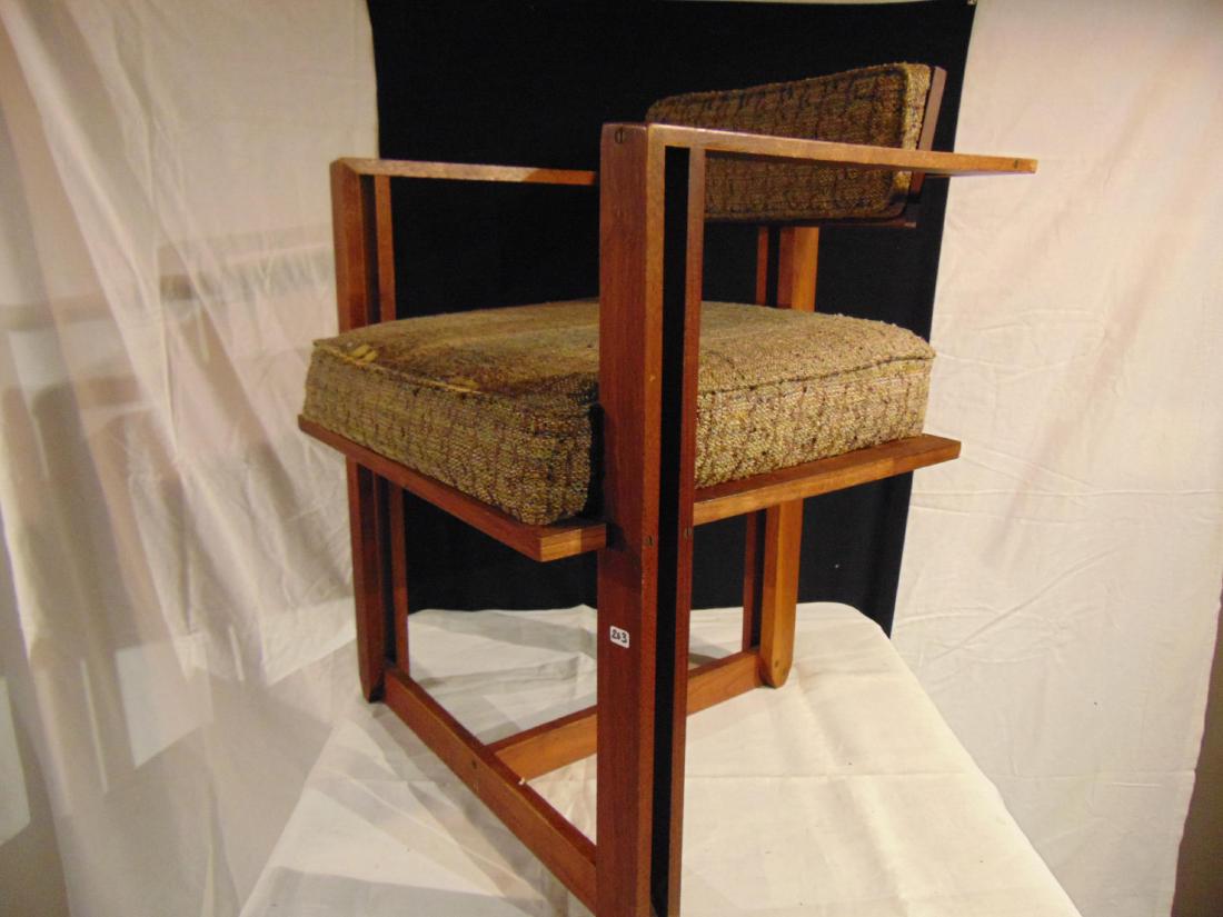 Michael P. Johnson signed arm chair with Frank Lloyd: This chair was out of the Johnson home and has been authenticated by him when we sold a large group of items of his. 29" tall, 22" across, 19" deep.