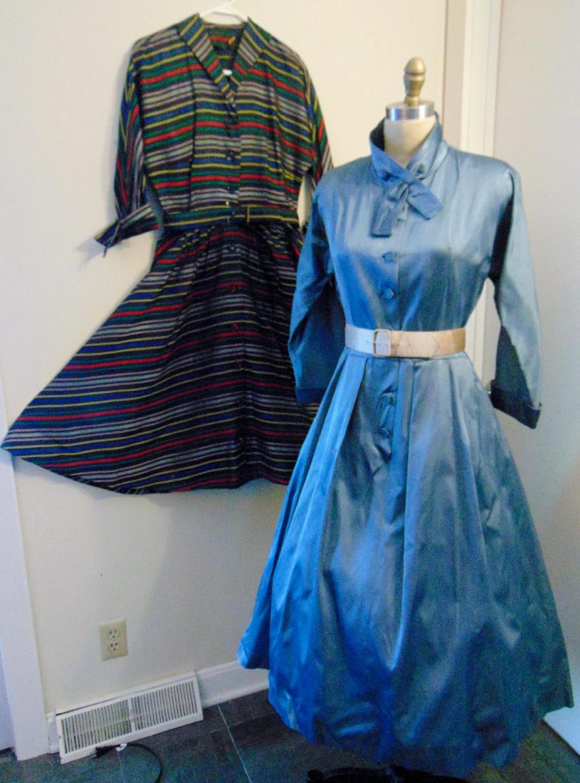 Vintage 1940's Dinner Dresses Jane Higgins: Vintage 1940's ladies Jane Higgins blue satin dinner dress, with pleated skirt and matching belt; along with a 1940's ladies striped dress with matching belt.