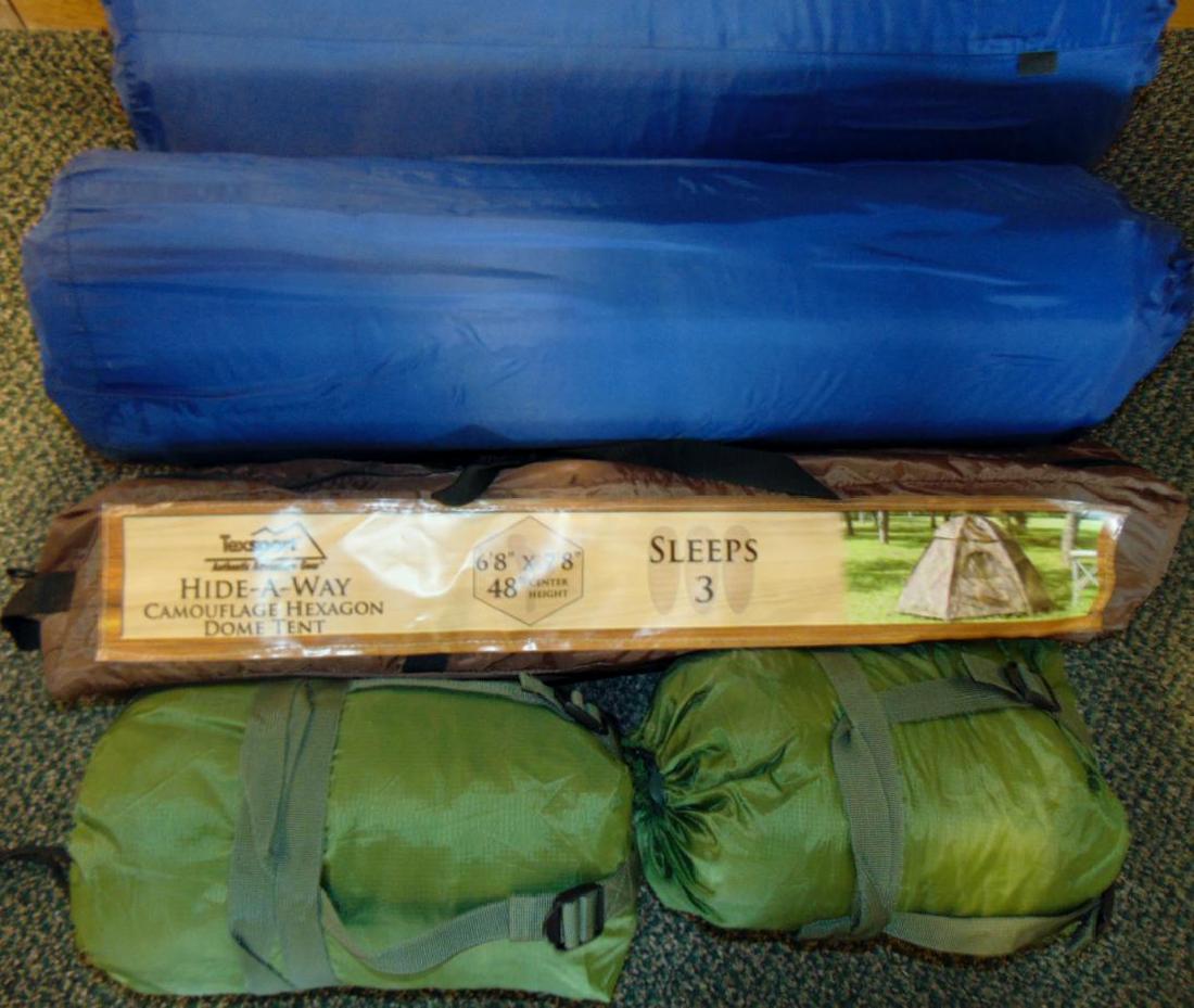 Group of Tents & Sleeping Gear: Camping lot to include: 6'8" x 7'8" Texsport Camo Tent, sleeps 3; 2 Therm-A-Reset self inflating sleeping mats; and 2 CamoSystems.com tents.
