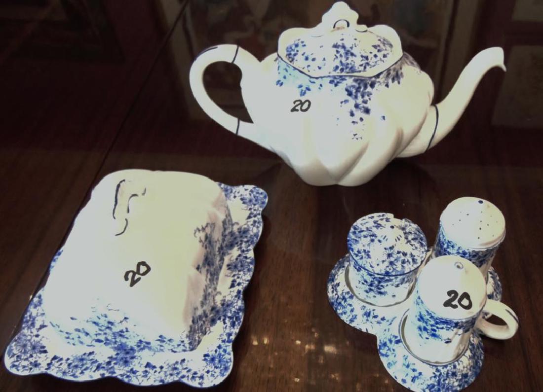 Shelley English Bone China Teapot, Butter Dish, Salt &: Shelley English bone china (Dainty Blue) pattern, blue & white floral. Includes covered teapot (6" h), 1 covered butter dish (6.5" l x 5.5" w ) and a 3 part condiment salt and pepper holder. All in ex