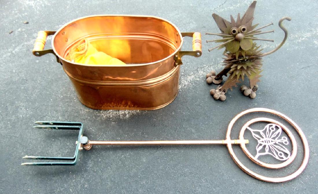 Copper Double Handled Boiler, Water Sprinkler, Folk Art: A copper double handled boiler, copper spinning water sprinkler and a cast iron, folk art cat sculpture.