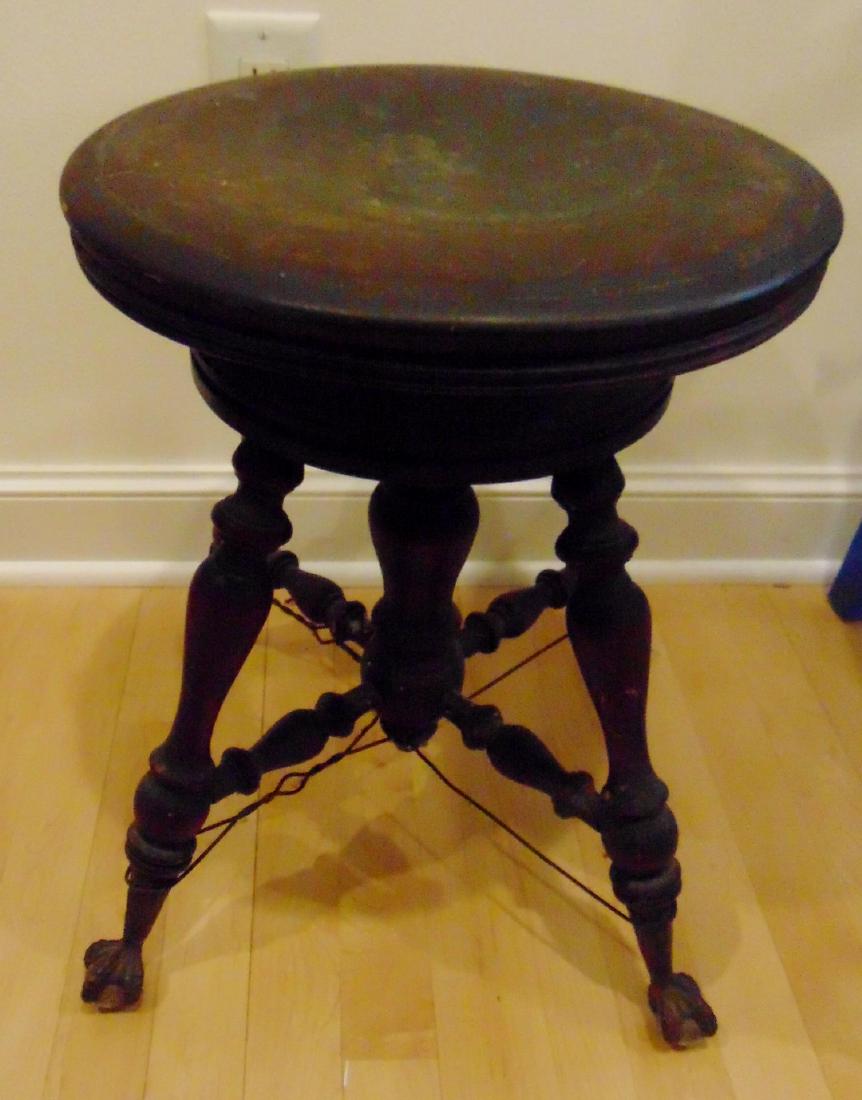 Piano Stool: Claw foot mahogany piano stool.