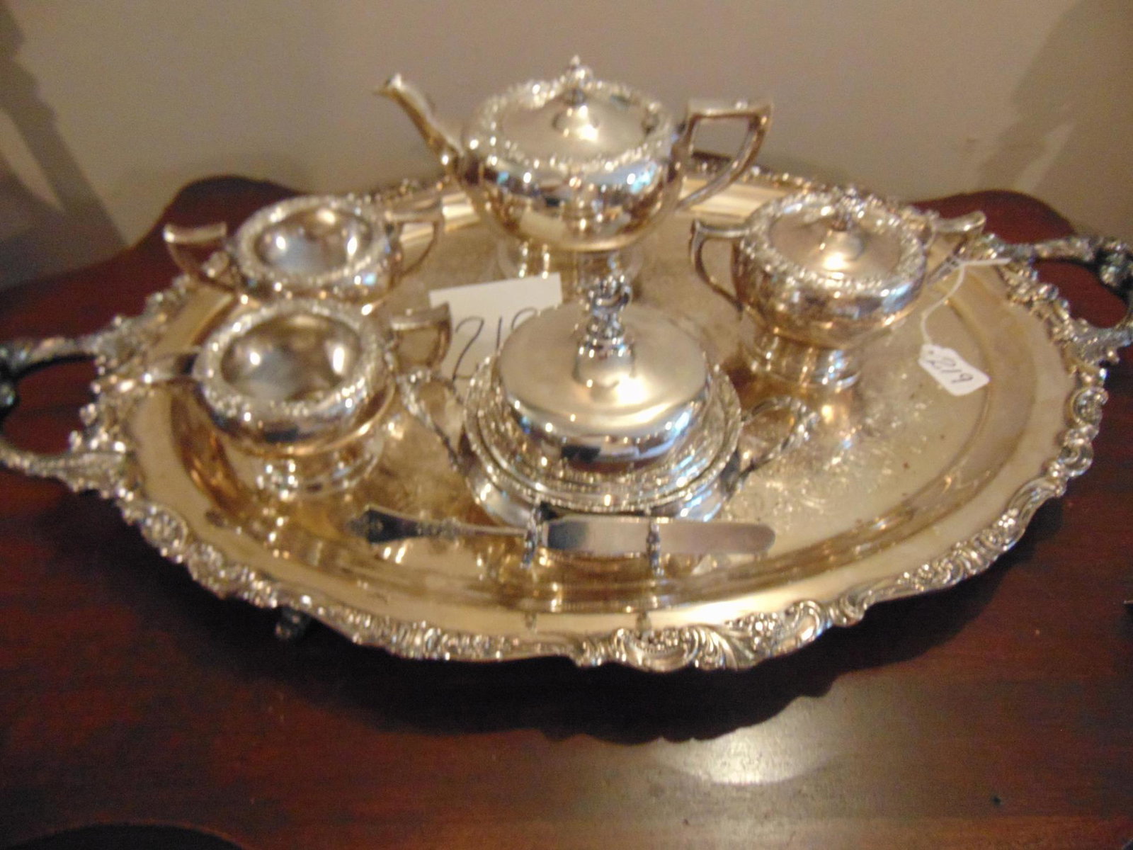 Quality Silver Plate Tea Service: Quality Silver Plate Tea Service by Forbes Silver Company includes Tea Pot Creamer/Sugar and Waste Bowl, along with Victorian covered butter and a footed and handled serving tray