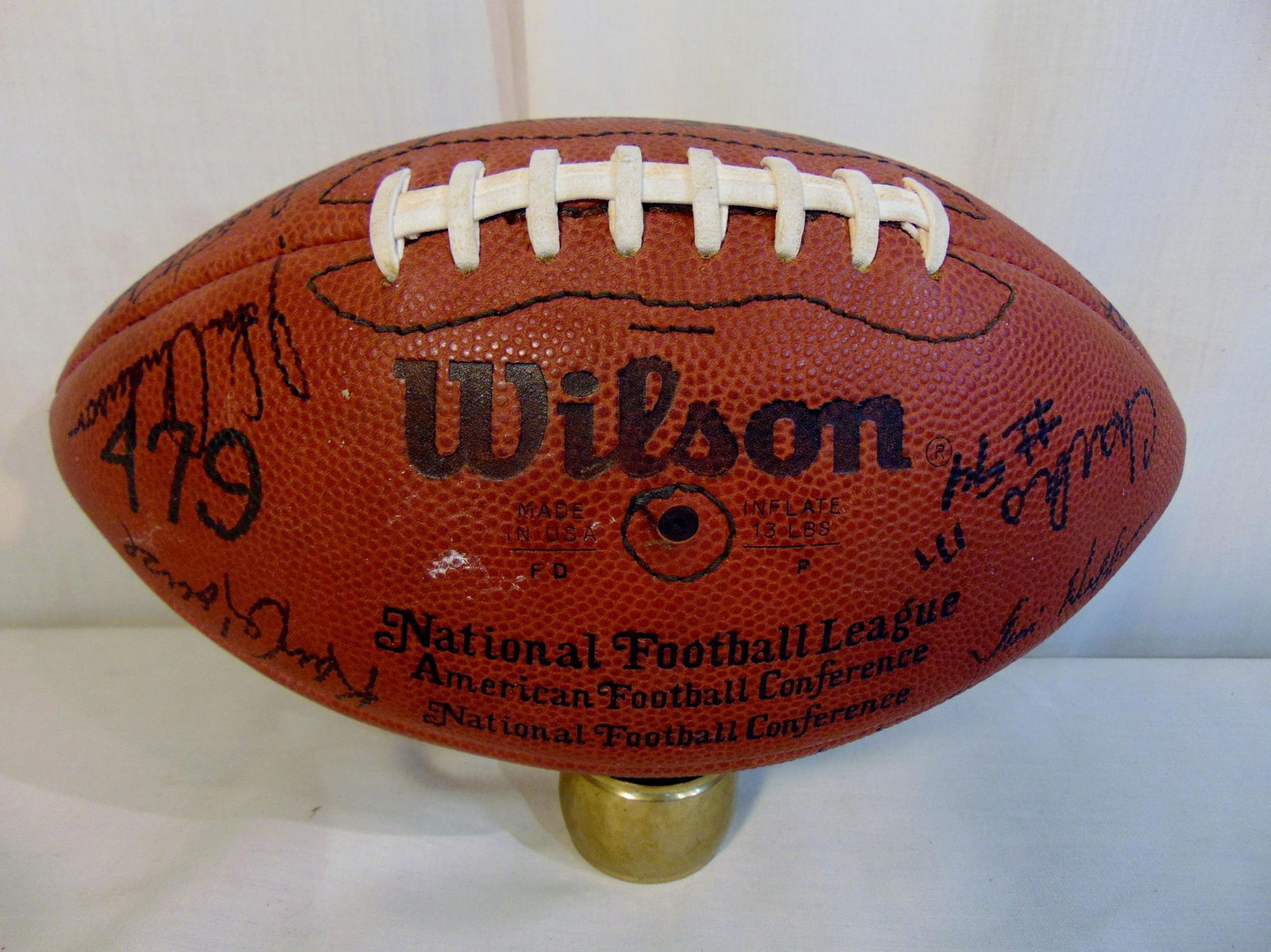 Autographed National Football League Football: Autographed Green Bay Packers Football with 37 signatures including Randy Wright, John Anderson, Lynn Dickey, Bill Neil, Mark Cannon, Robert Brown, Paul Coffmann, Dennis Humphry, Tim Hoffman, Lenny Ta