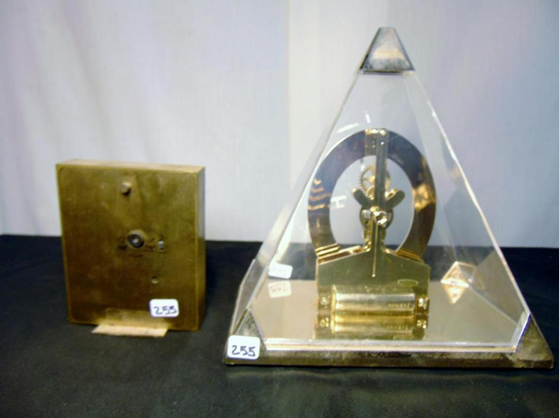 MCM Seico , Howard Miller Scalitin Pyamid: These clocks include a Seico that is black and torquoise enameled on brass. The Howard Miller is in a clear Scalitin pyramid style. Seico is 5"Tx4" and the pyramid is 9.5"T
