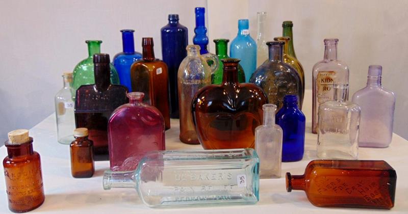 Antique Bottles: A large lot of antique bottles and more