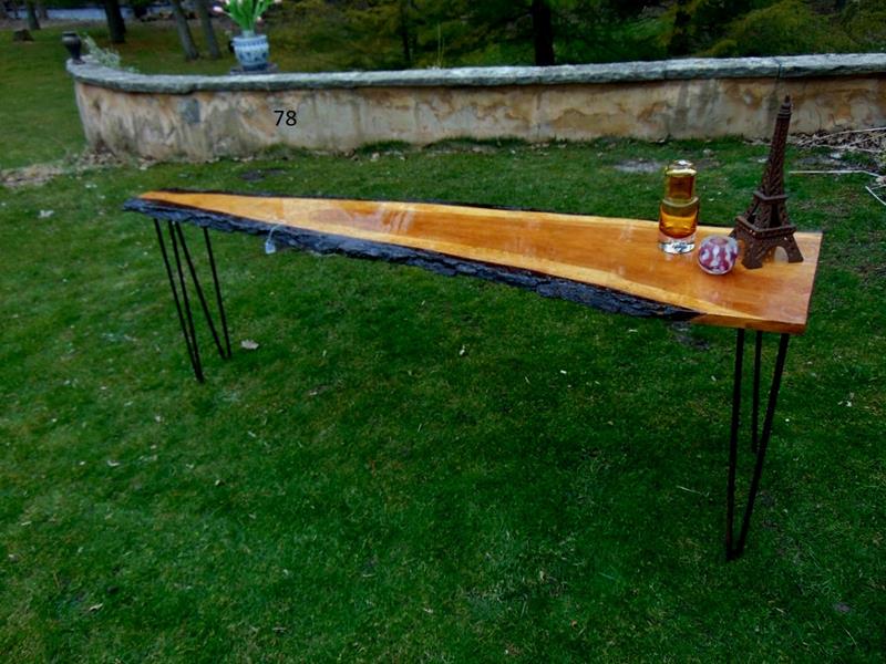 MCM Raw Wood Live Edge Table: Mid Century Modern Verticall Cut Raw Edged Old Growth Pine on Iron Hair Pin Legs. This amazing sofa style table has that raw Nakashima look. It measures 86"L x 19"D x 29.5"T. Depth is 8.5" at skinnies
