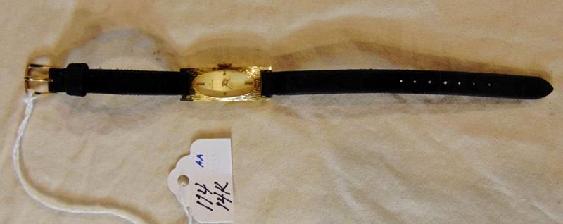 14K Yellow Gold MILUS Ladies Watch: 14K Yellow Gold MILUS Ladies Wrist Watch weighing 11.4 grams. Band measures 6.5"l, face measures 1.5" x .5".