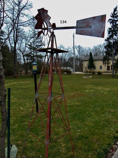 WindMill: Tin 7' Yard Ornament Wind Mill in working condition with Original Paint from the 1940's/'50's.
