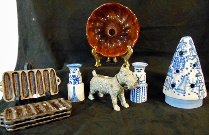 Hadley China & more: A group of Hadley china to include Candlesticks and a Candy Cane Holder. There is also a Scottie Dog door stop, a Benington Bundt bowl, and 4 Cast Iron corn molds. There is minor loss to the bundt pan