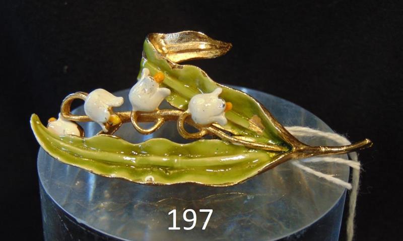 Weiss Enamel Brooch: Weiss Enamel Brooch depicting Lillies of the Valley. This Rare '50's Weiss Multi-hued Enamel Brooch depicts Lillies of the Valley in a Gold Setting and measures 3"Tx1.25"W and is in Excellent Conditio