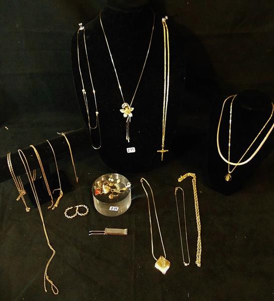 Costume Jewelry Lot: Lot of Quality costume Goldtone Chains, Charms, and Brooches including Crosses, Floral Lariette, Fur Clip, Rings, Earrings, and More!