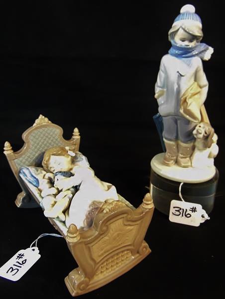 Llardro Porcelein: Pair of Lladro Porcelein depicting Young Girl in Cradle with Doll and a Boy in Winter Clothing and his dog. They measure: Boy 8"Tx3.5"W, Girl in Cradle; 5"Tx6.5"Lx4"W.