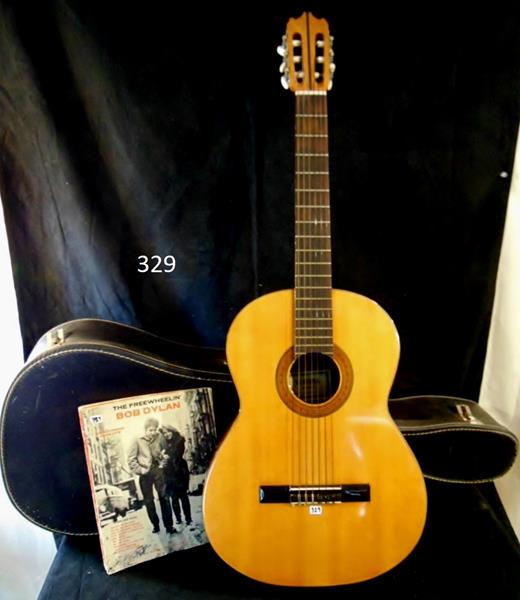 Classic Accoustic Guitar: Classic Accoustic Guitar by Ventura Bruno with Carrying Case in Excellent condition along with Bob Dylan Song Book. This beautifully Crafted Ventura Guitare measures 40"Lx14.75"W.