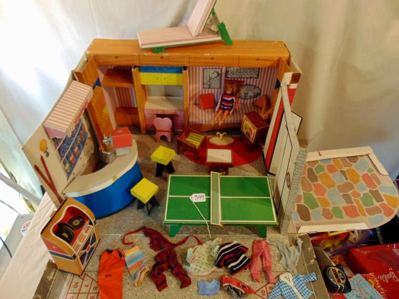 Ideal's Tammy Club House: Ideal's Tammy's Club House Portable Playroom to include Tammy Doll, soda foutain, T.V., furniture, juke box, ping pong table, and assorted outfits. It measures 14"Tx26.5"Wx8.5"D.