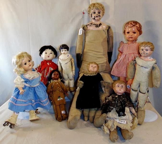 Lot of 9 Dolls: Lot of 9 Dolls to include large Victorian Minerva doll with Metal Head and Glass Eyes with a Soft Body in poor condition, 1940's Ideal Sleepy Eye Doll on Roller Skates, Japanese Jointed Composite Doll