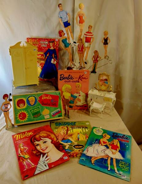 Ken and Barbie Lot: Ken and Barbie lot of cutout dolls to include Barbie and Ken stand-up doll suitcase by Mattel 1962 filled with paper outfits and stand-up Barbie and Ken, Barbie costume dolls folder, Skipper Off to Ca