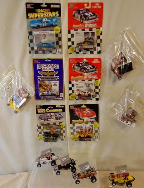 Collectors Cars: Group of Collectors Cars to include 5 unopened racing champions collectors cars to include Richard Petty, Rusty Wallace, 2 Ernie Irvin, and Alan Kulwicki, 3 opened racing champion collectors cars and