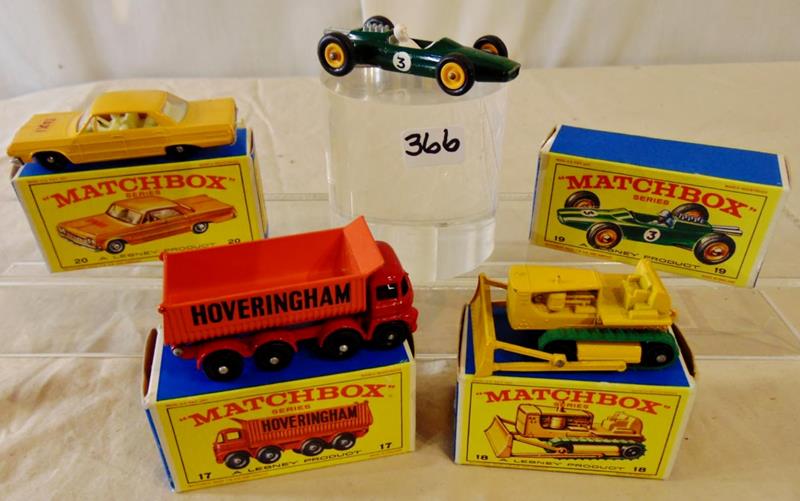 Group of Matchbox Lesney 1968 Mint: Group of Matchbox cars by Lesney Products, 1968, in mint condition, in original boxes, to include #17 8-Wheel Tipper; #18 Caterpillar bulldozer; #19 Lotus Racing Car; and #20 rare Taxi Cab. All in min