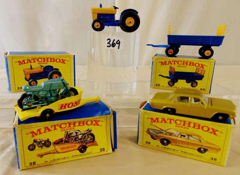 Group of Matchbox Lesney 1968: Group of Matchbox cars by Lesney Products to include: #36 Opel Diplomat; #38 Honda M/Cycle and Trailer; and #39 RARE Ford Tractor. All in Mint unplayed with condition, in respective original boxes.