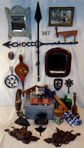 Country Primitive and Folk Art: A lot of Country Primitive and Folk Art to include a Country Weather Vane, Norweigen Hand Carved Tina Box, Floral Carved Bellows, 2 Antique Mirrors, Old Wooden Shoe Form, Wrought Iron Pizelle Form, Cu