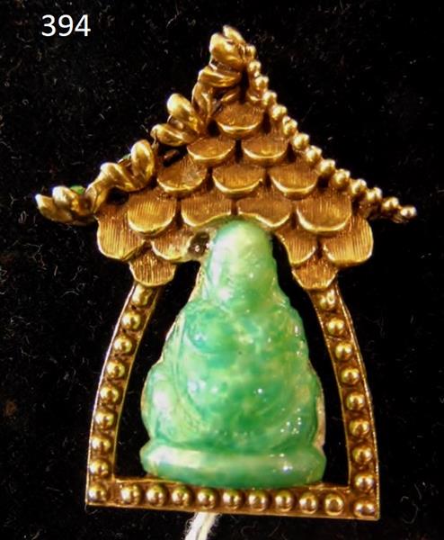 Hattie Carnegie Buddah Brooch: Hattie Carnegie Buddah in Temple Brooch. This quality brooch is in excellent condition and measures 1.75"Tx1.5"W