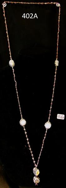 Amythist, a Pearl and Labradorite Necklace: Long strand of Amythist Beads on a chain with intermediate Gem encrusted larger stones of Druisy, a real Fresh Water Pearl, and Labradorite. This excellently Crafted Necklace measures 23.5"L