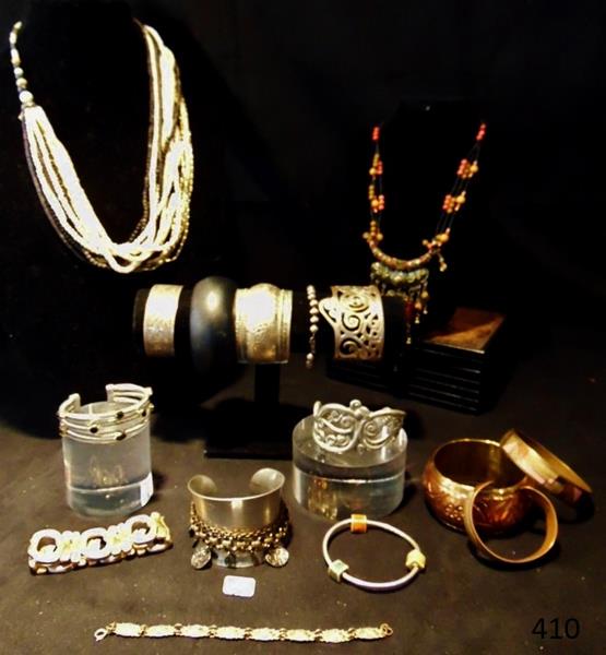 Group of Quality Costume Jewelry: This group of quality costume jewelry includes a Bead and Bone multi-strand necklace, and Enamel necklace, Indian bracelets, Sterling Bead bracelet, bangles, cuffs, and more!