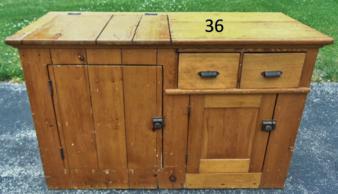 Pine Flip Top Dry Sink with Double Doors and 2 Drawers: This early flip top Pine dry sink has double doors compartments and 2 drawers with ornate cast pulls and 2 ornate twist lock closures on door. Condition: used, refinished, lock coach missing on one do