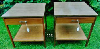 MCM Pair of Paul McCobb End Tables: This pair of MCM end tables were designed by Paul McCobb and made by Calvin in Grand Rapids. They each have a single drawer and are made with Black Walnut and the lower shelf is basket weave. Top of t