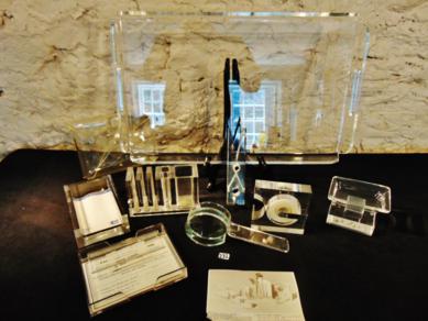 MCM Group of Lucite Desk Accessories: This MCM group of Lucite desk accessories and Lucite tray includes a magnifying glass, VIP desk pen organizer, tape dispenser, 2 note card holders. A folded letter holder in the shape of an envelope, 