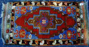 Antique Hand Tied Prayer Rug: Hand tied Iranian rug in silk and wool. With geometric flowers, 21" x 40"