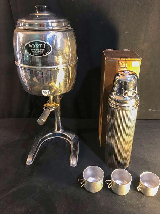 1950's Wyott Cream Dispenser and Chrome Thermos: This 1950's Wyott Cream Dispenser was from an old Soda Fountain and measures 21" tall X 8" across X 8.5 deep. Also included is a chrome 1940's Landers, Frary and Clark thermos in a wooden carrying box