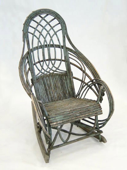 Early hand made andirondack armed twig rocker with : Early hand made andirondack armed twig rocker with elements of original green paint - (est. value $200 - $300)