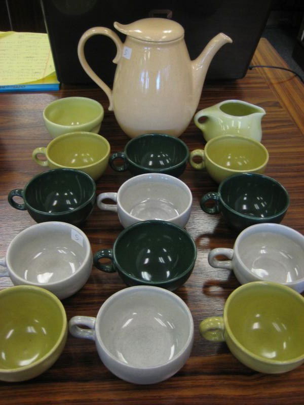 Group of Russel Wright china - creamer, sugar, 12: Group of Russel Wright china - creamer, sugar, 12 multi-colored coffee cups along with a teapot - (est. value $75 - $85)