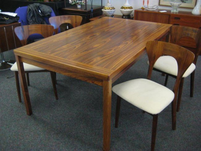 20th Century Modern Scandinavian, Rosewood dining: 20th Century Modern Scandinavian, Rosewood dining room set - artist signed by Koefoeds Hornslet, made in Denmark - in good condition consisting of Rosewood refractory table and 4 rosewood side chairs