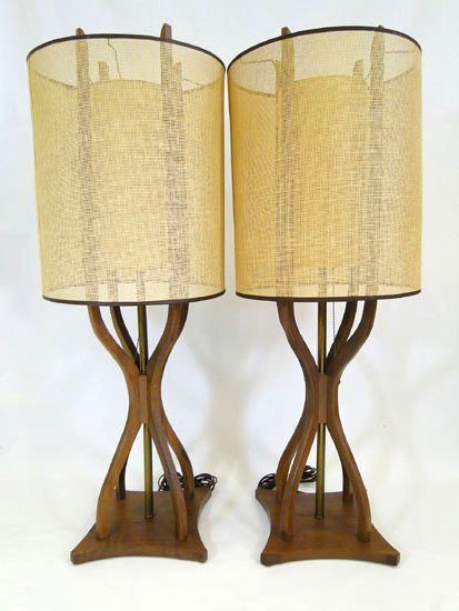 A pair of walnut 1960's table lamps with parchment: A pair of walnut 1960's table lamps with parchment and cane shades - (est. value $100 - $175)