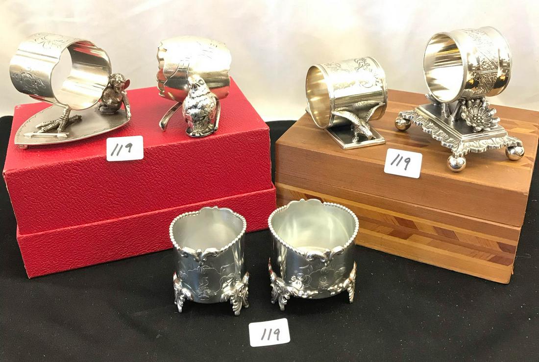 Victorian Ornate Silver Plate Napkin Rings, More!: This group of very fancy and ornate Victorian silver plate napkin rings include a Rogers Brothers cupid napkin ring with a birds foot and an arrow, a Derby Silver company Broken egg that reads Best Wi