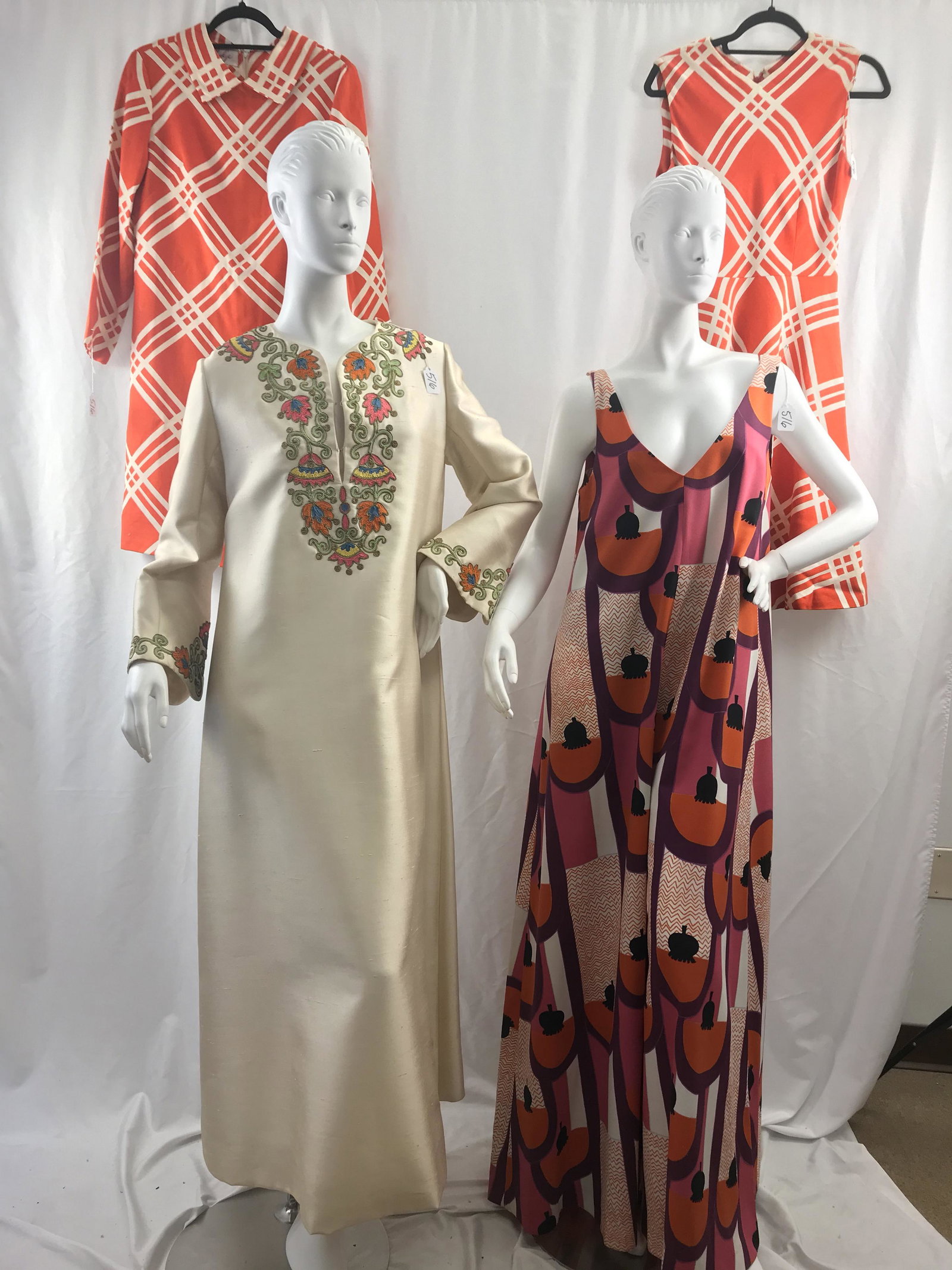 Group of Mod 60's and 70's Vintage: This group of Mod Vintage 60's and 70's garments include a 60's silk embroidered caftan with a Marshall Field's Label Sz 12), a bold print palazzo pants jumpsuit (sz 14), and two Joan Leslie dresses i