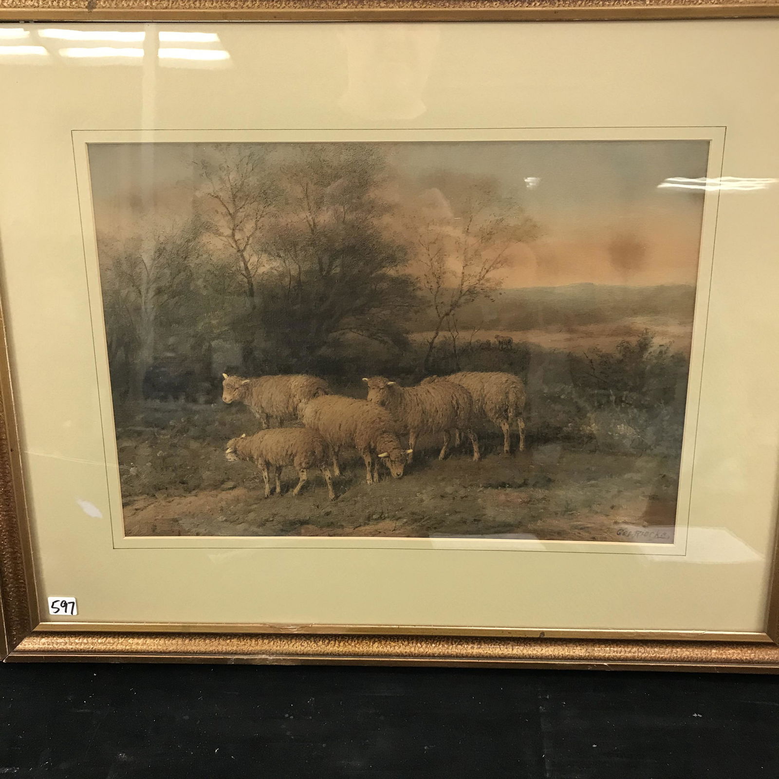 George Riecke Arts & Crafts Print of Sheep: This Arts and Crafts era print is by listed artist George Rieke and depicts a flock of sheep in the meadow. In its original Arts and Crafts frame, this work measures 20" tall X 25" across.