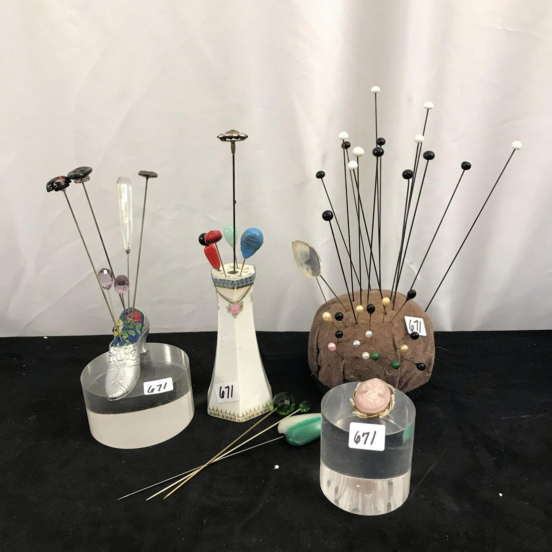 Group of 1900's Hat Pins, Cameo: This group of 1900's hat pins include a 1920's metal shoe pincushion, a porcelain hatpin holder, 45 fancy hat pins, a large velvet hatpin cushion, and a glass cameo brooch.