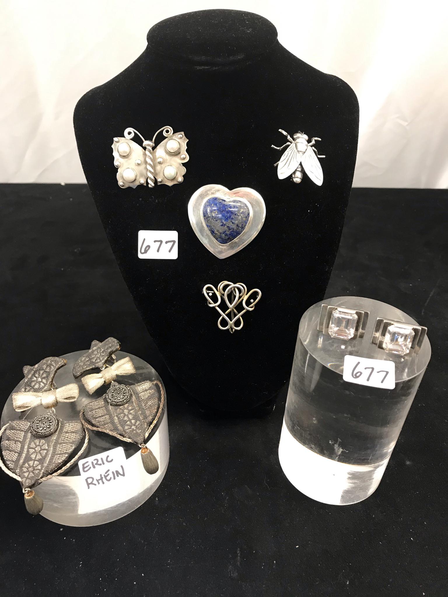 Eric Rhine Earrings, Sterling Pins, More!: This group of sterling silver ladies jewelry include a pair of signed Eric Rhein mesh clip earrings, a pair of sterling clip earrings with large white stones, a hand made butterfly brooch with natural