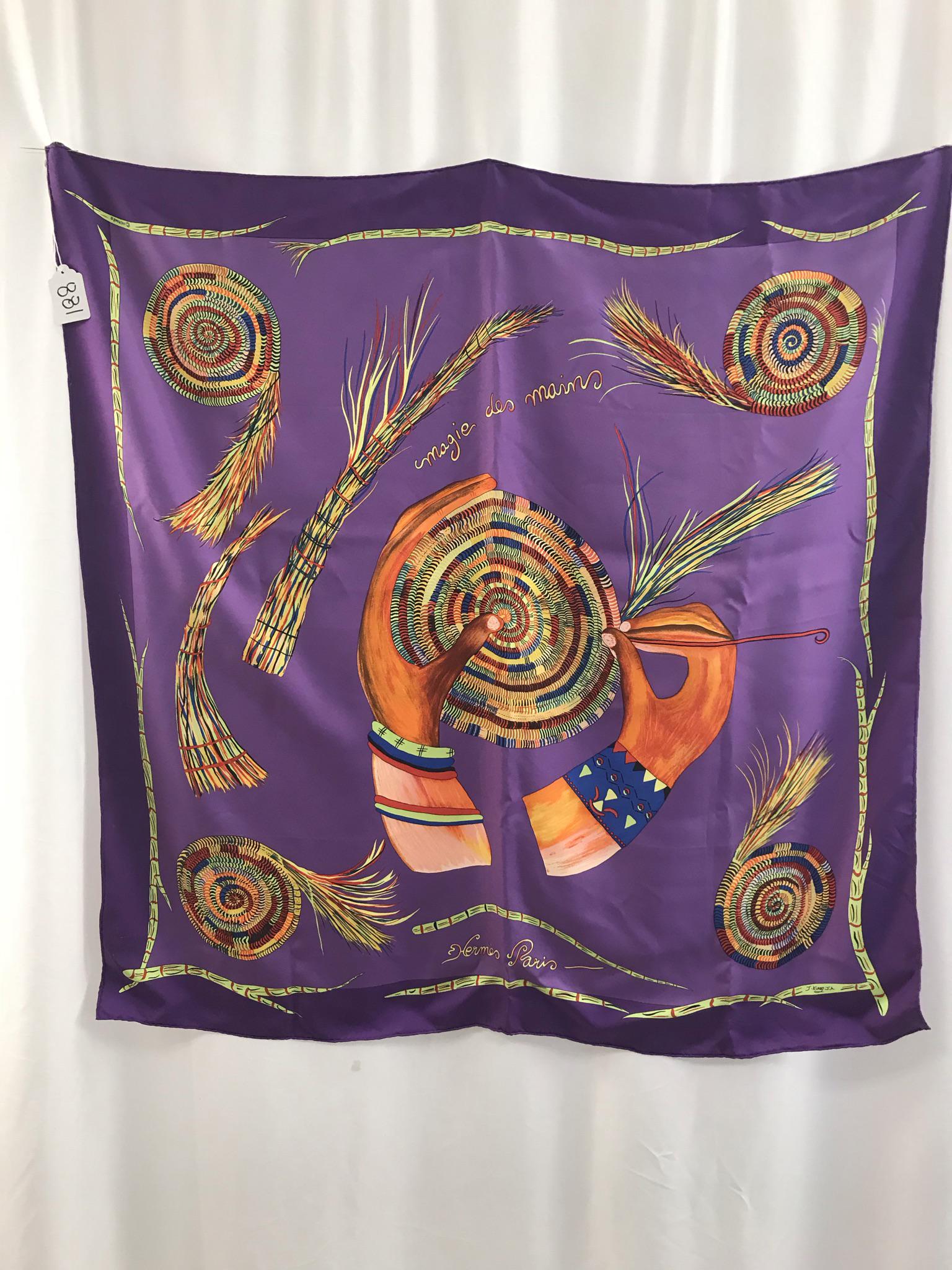 Hermes Silk Magie des Mains Vintage Scarf: This Hermes silk charmeuse multi colored scarf by Jacob Jeremiah Kuany is in excellent condition and measures 34" tall X 34" across.