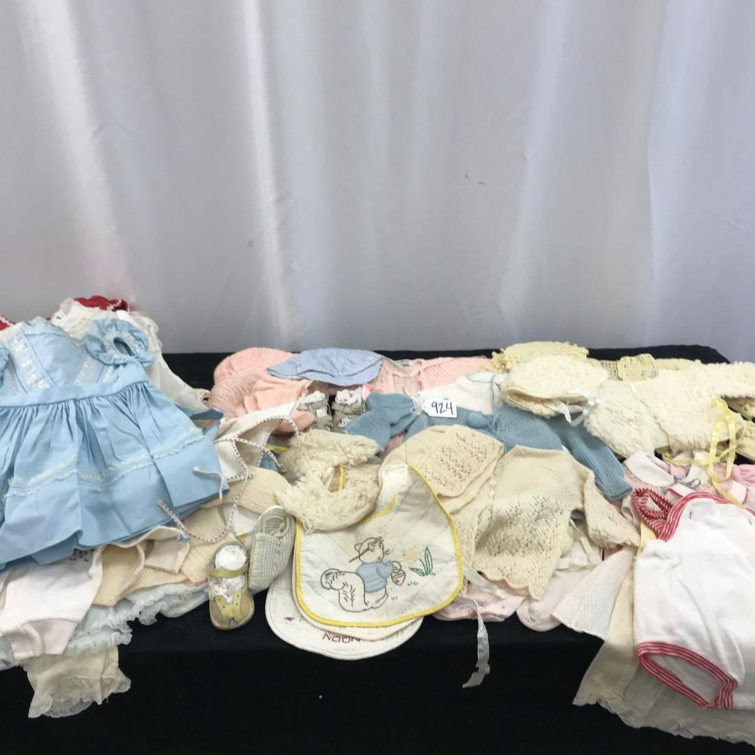 Large group of 50's baby clothing, Knitwear, More!: This large group of 1950's baby clothing includes rompers, bonnets, socks, shoes, multiple sweater sets, little girls dresses, boys clothing, socks, bibs, 3 baby blankets and more!
